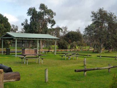 Park with BBQ facilities.