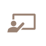 Icon of a person standing in front of a board and gesturing to it
