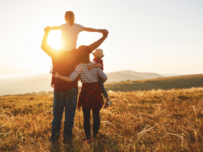 Image of a family at sunset