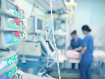 Image of nurses around a bed in CCU