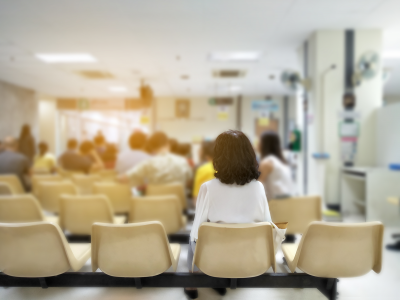 Image of people sitting in an emergency department waiting room