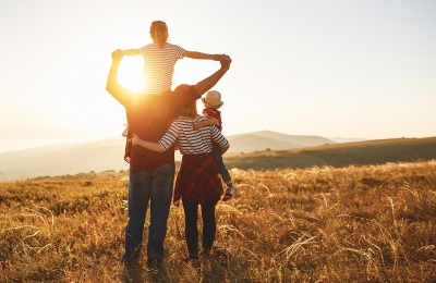 Image of a family at sunset