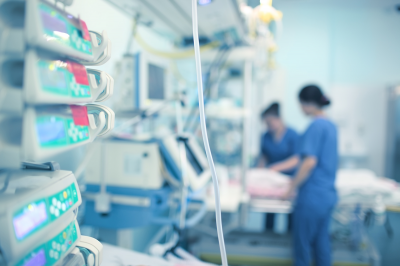 Image of nurses around a bed in CCU