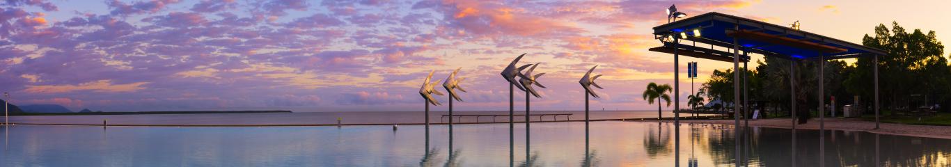 Cairns Lagoon at sunset pink sky